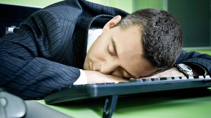 A businessman napping