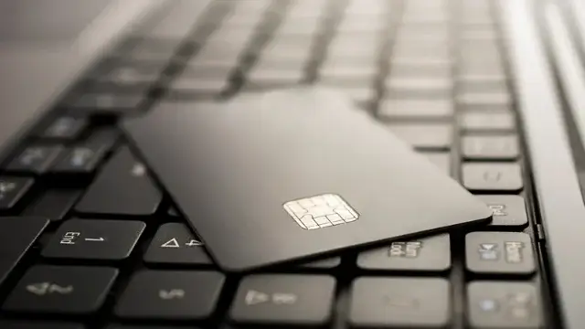 A credit card on top of a business desk