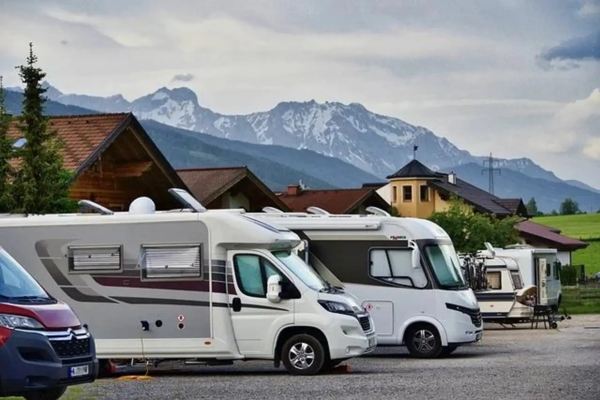 An RV van parked on the side of a road