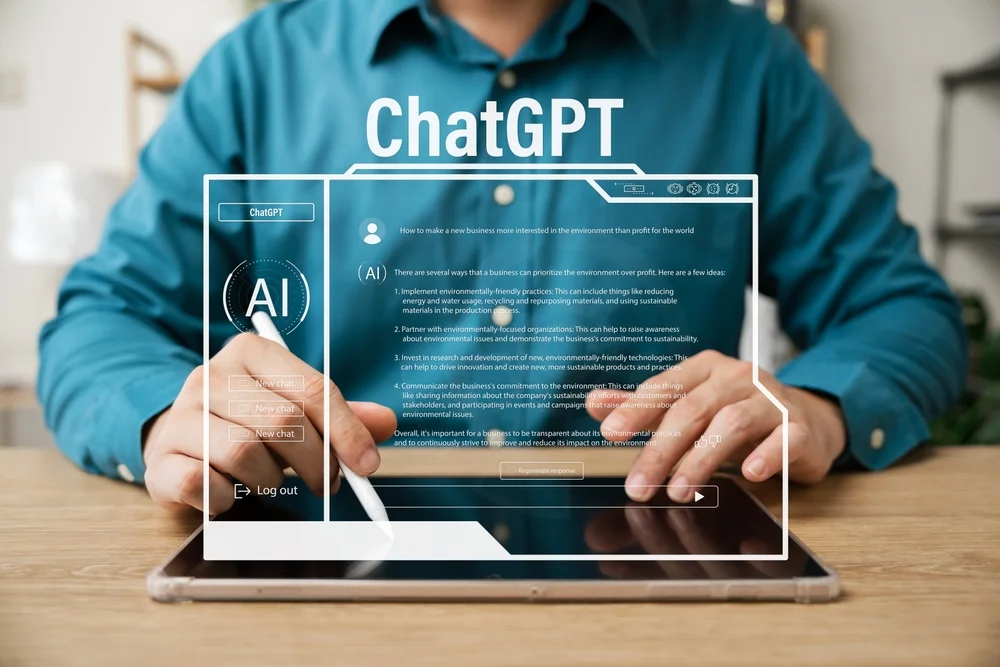 Close-up of a computer screen showing ChatGPT's interface, with a text box and chat bubbles