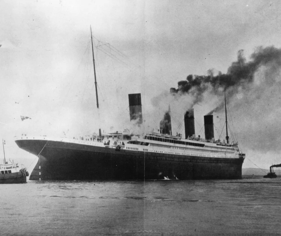 A black and white photo of the Titanic middle of the ocean