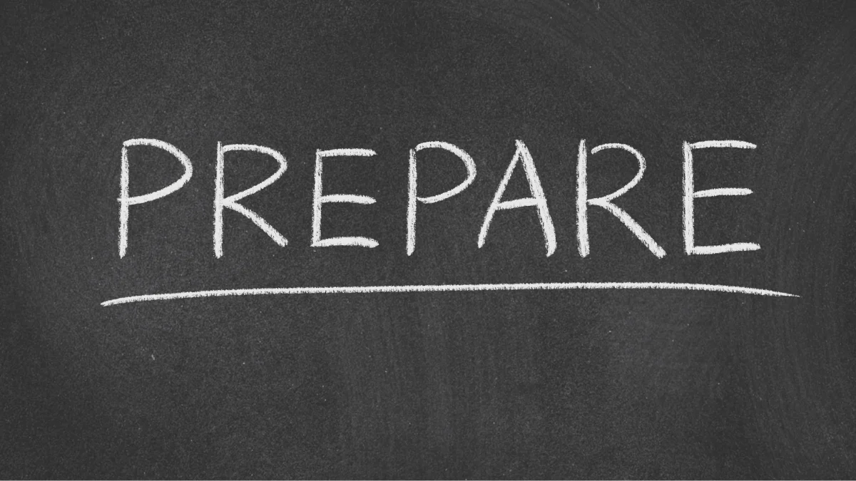 A neon sign that says prepare