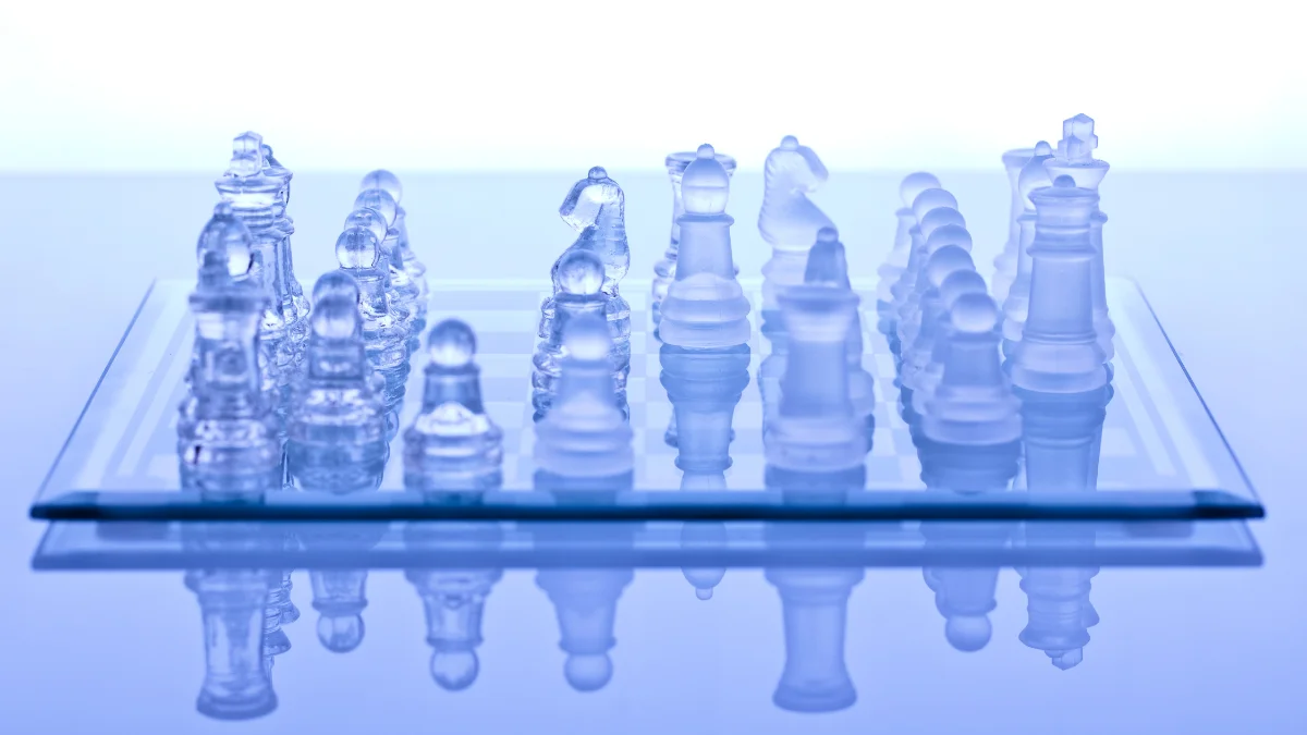 player contemplating their chess moves, demonstrating how chess can increase self-awareness by prompting reflection on one's strategies and decisions