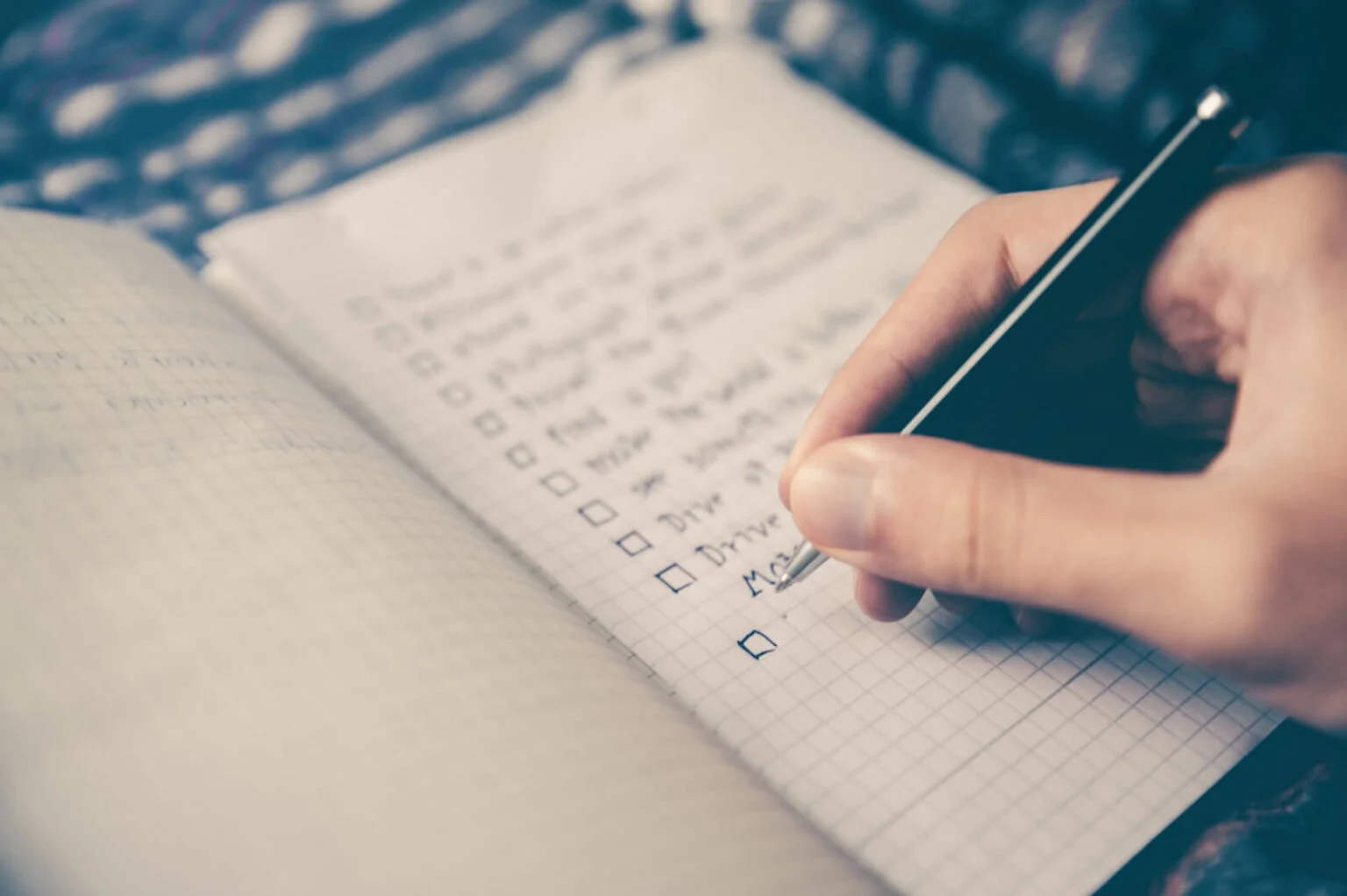 A blogger making a to-do list for the next day