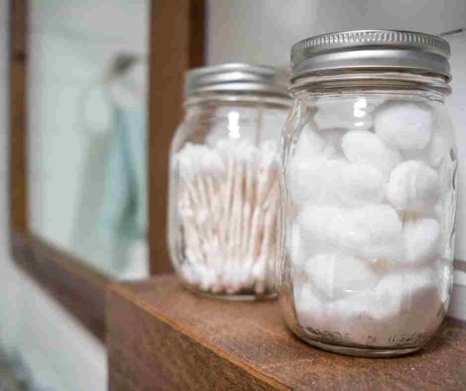 A mason jar filled with cotton balls
