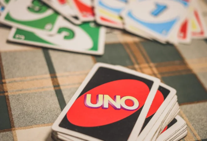 A pack of Uno game cards on a table