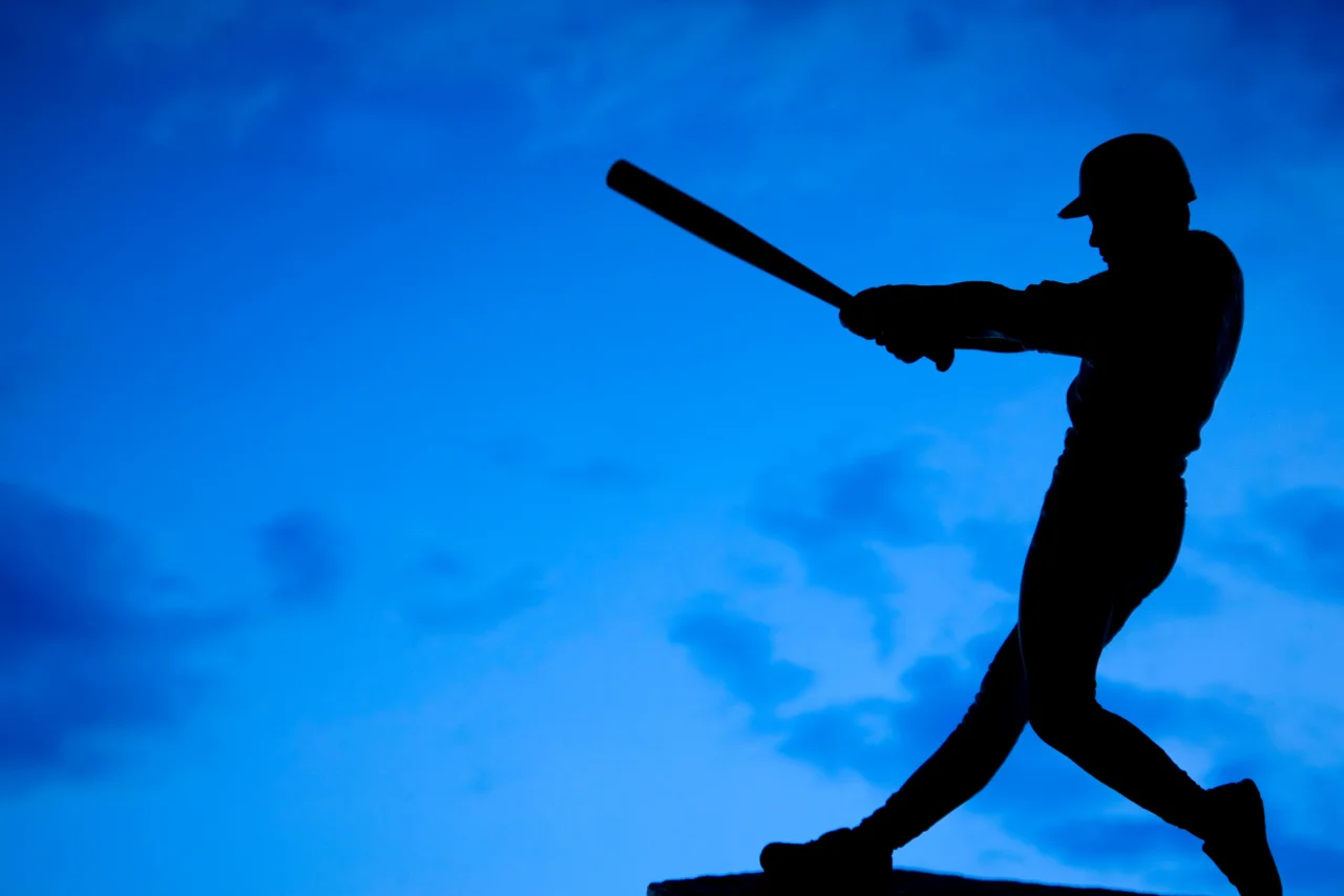 Baseball player hits the top of the roof at Olympic stadium