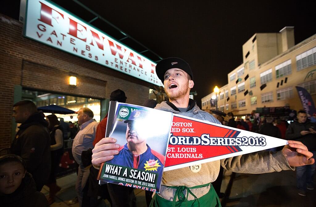 A fan in the stands at the 2013 World Series featuring the St Louis Cardinals and Boston Red Sox