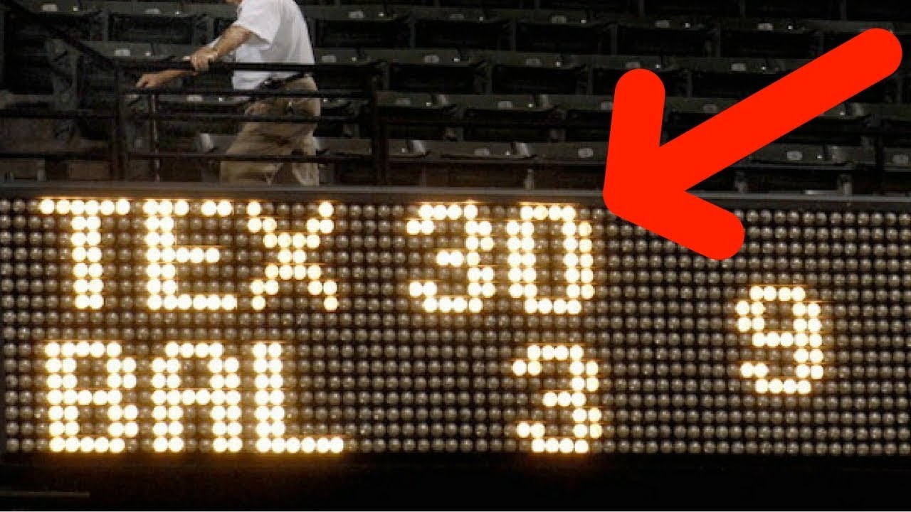 Scoreboard at a baseball stadium showing at lopsided score