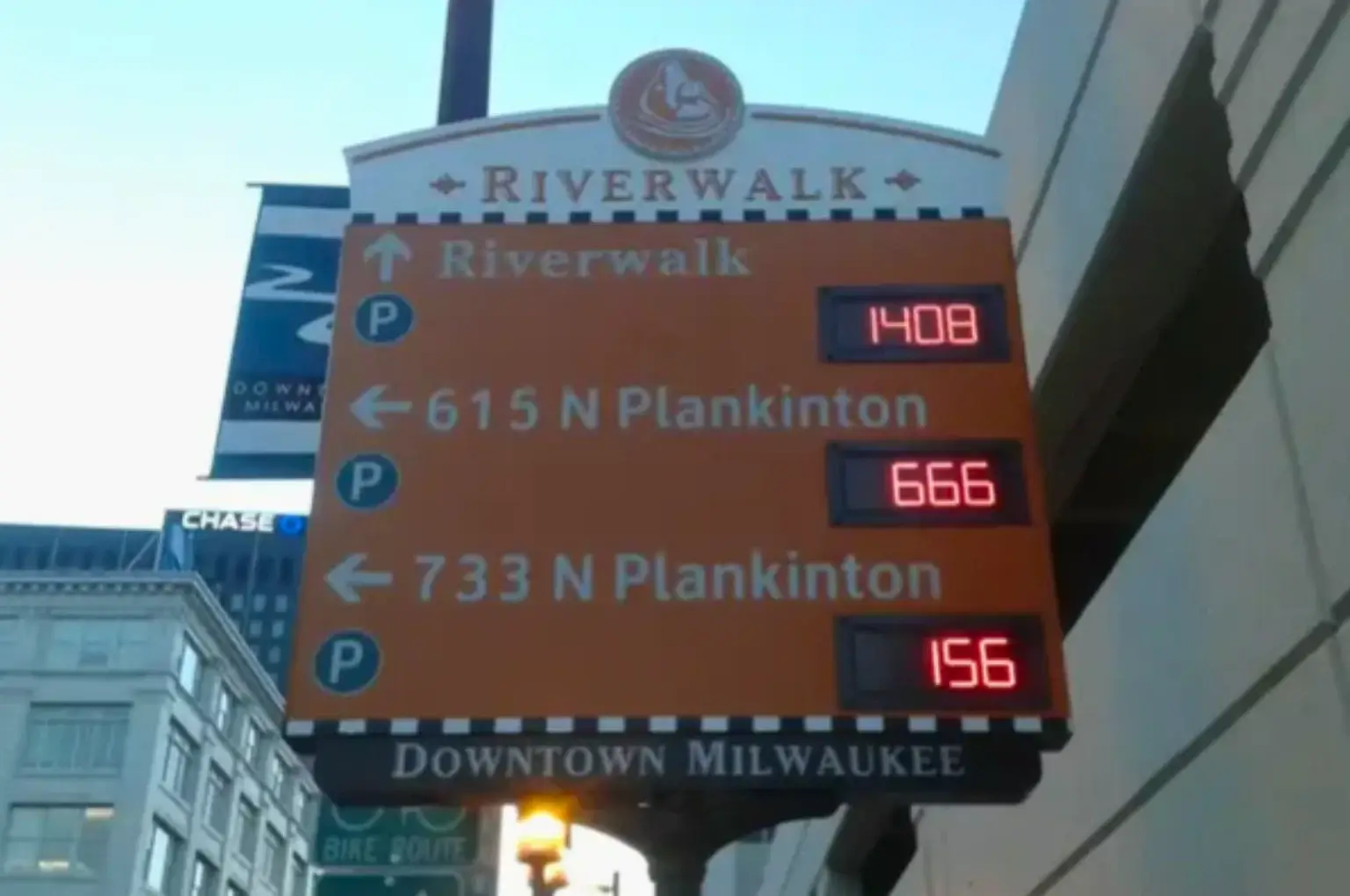 A parking lot sign showing interesting numbers