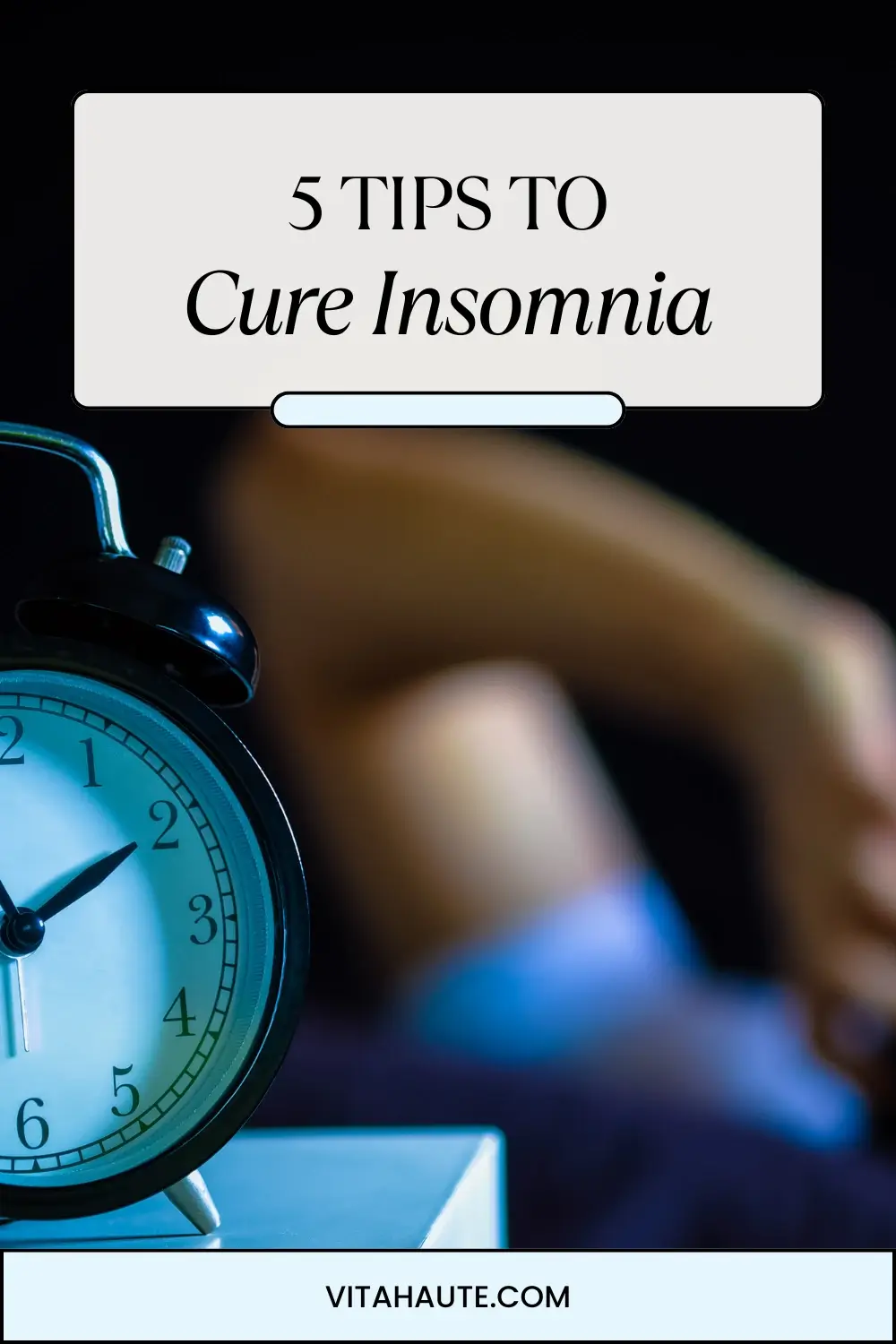 A man in bed with his hands over his eyes and a clock beside him that reads midnight