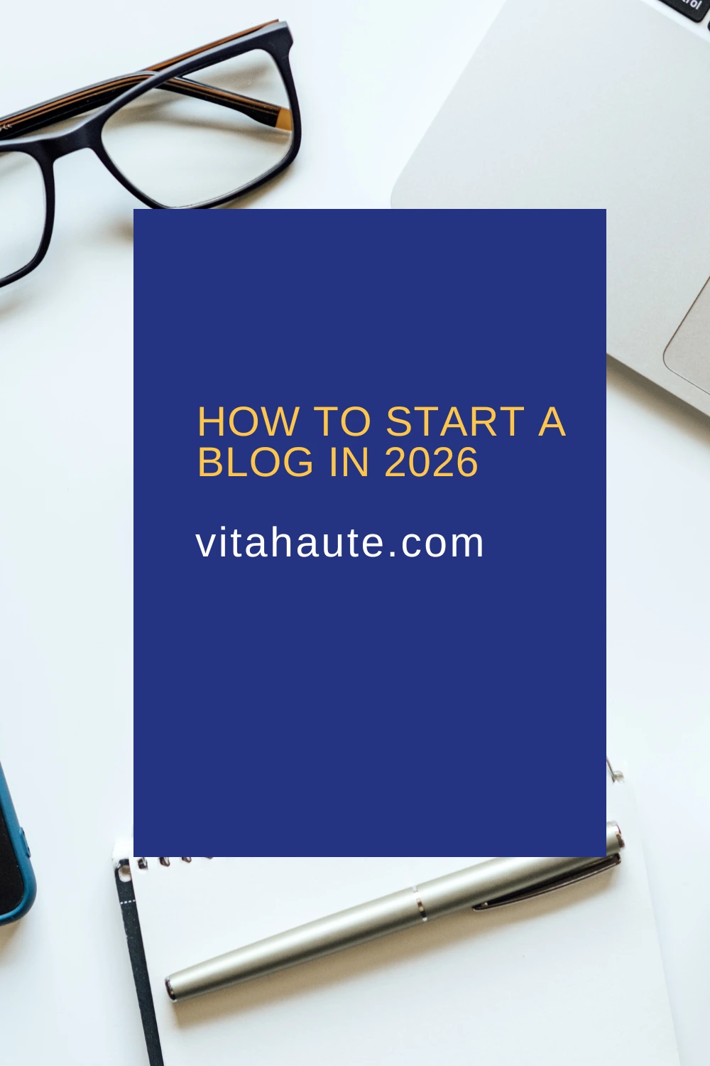 A person starting a blog on a laptop with notes and coffee nearby