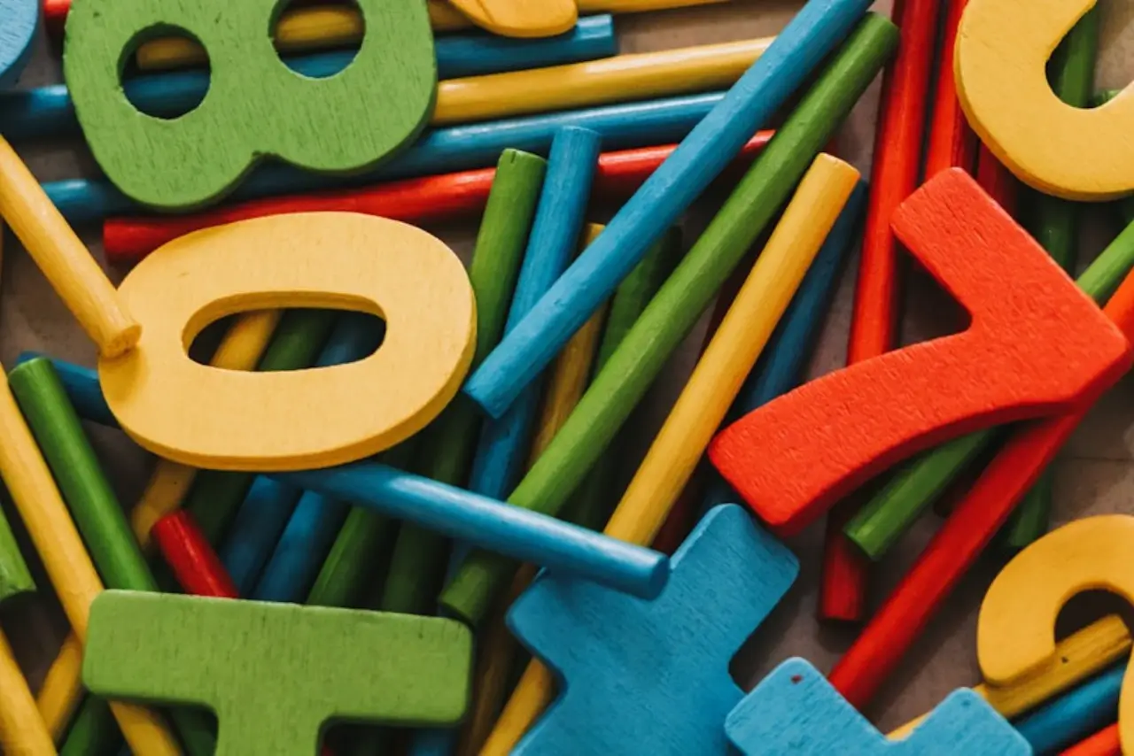 A pile of colorful wooden numbers