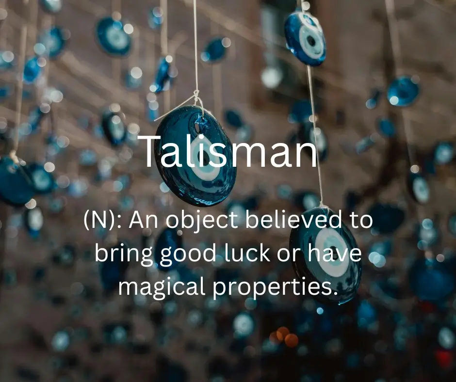 A small protective charm carried for good luck during important moments such as examinations or challenges
