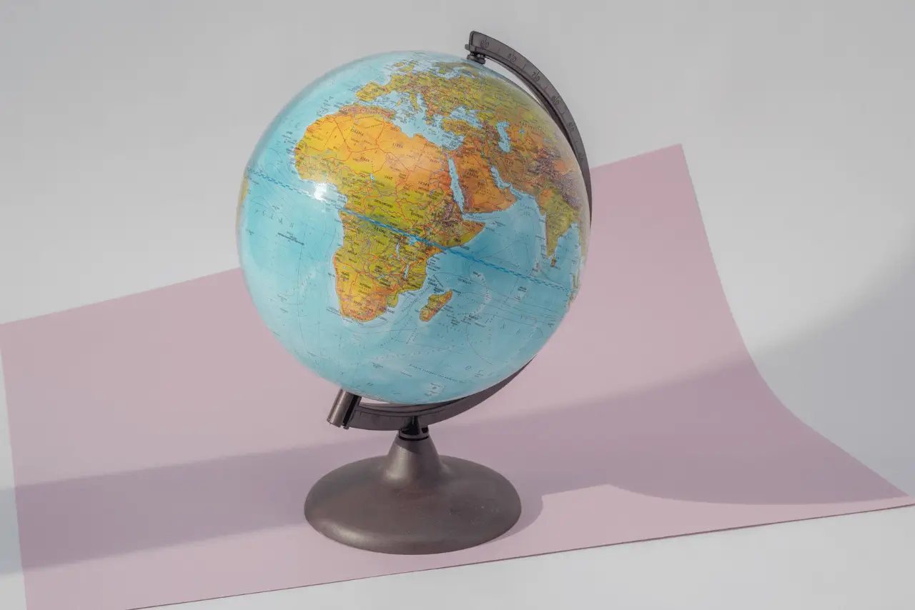 A world globe on top of a desk