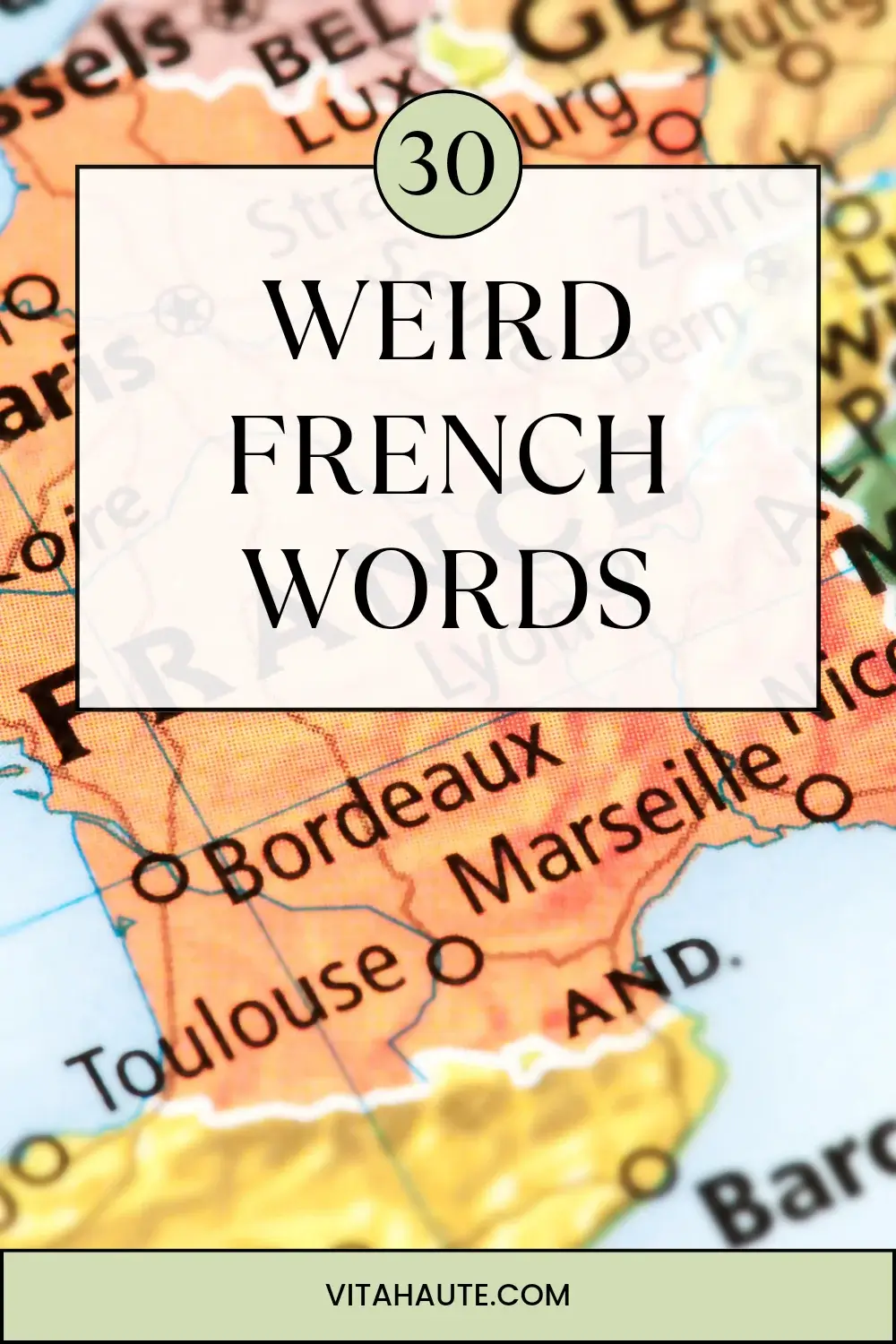 Person studying French vocabulary in a notebook